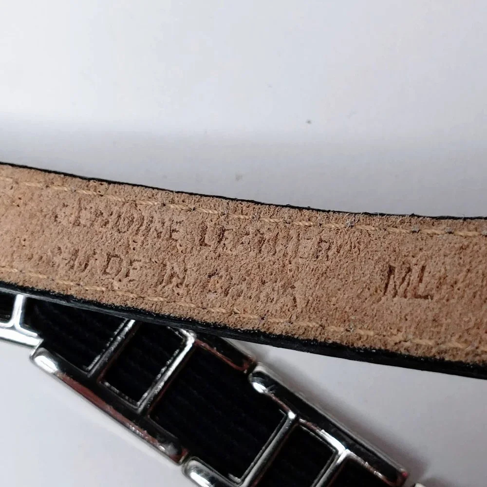 Apostrophe silver tone
